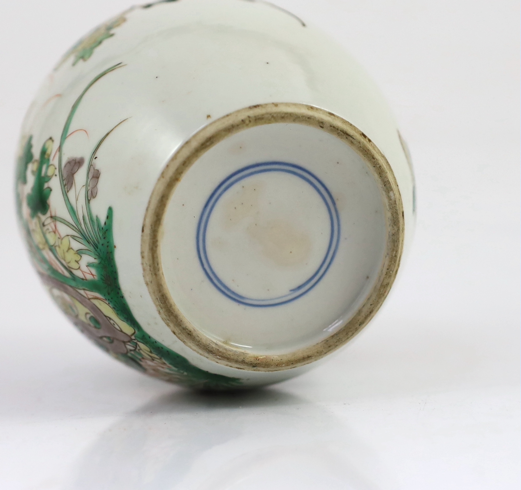 A Chinese famille verte small ovoid jar, Kangxi period, some wear to the iron red enamel